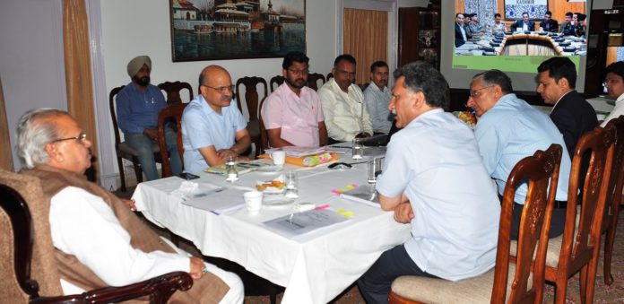 GOVERNOR CHAIRING MEETING TO REVIEW FLOOD PREPAERATION IN KASHMIR