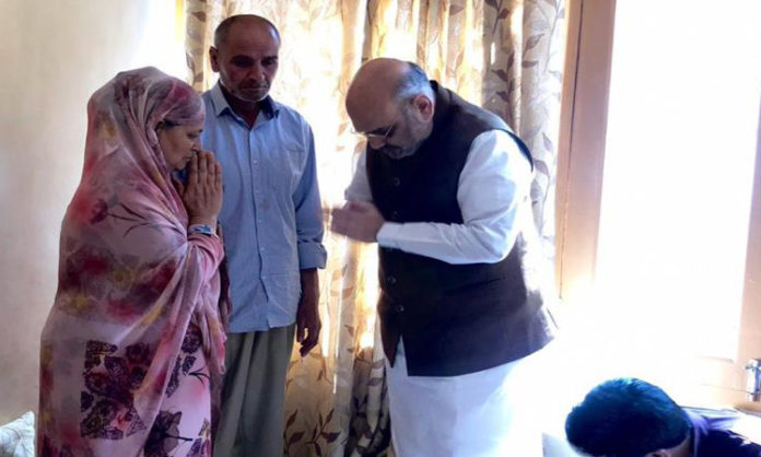 Amit Shah visits slain SHO family