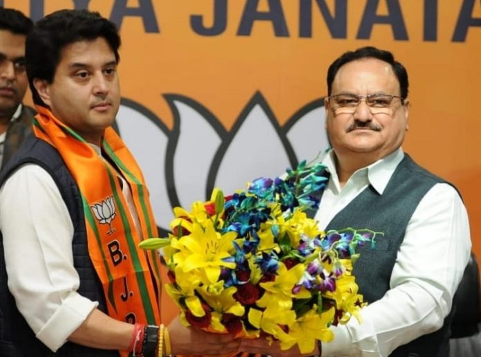Jyotiraditya Scindia and JP Nadda.